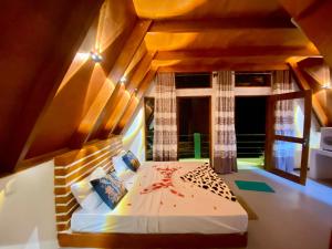 Ένα ή περισσότερα κρεβάτια σε δωμάτιο στο The Sunshine Ella