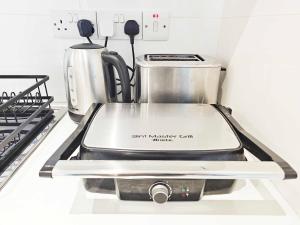 Η κουζίνα ή μικρή κουζίνα στο Alexander Residence Trikallon Str