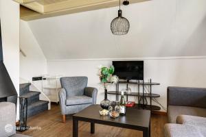 Μια τηλεόραση ή/και κέντρο ψυχαγωγίας στο Familiehuis op een rustig park