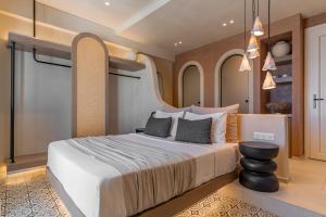 En eller flere senge i et værelse på Atlantic Island Suites