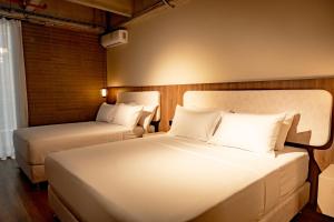 Una cama o camas en una habitación de Uukam by Bernalo Hotels