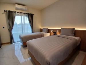 En eller flere senge i et værelse på Northerly นอร์ทเทอร์ลี่