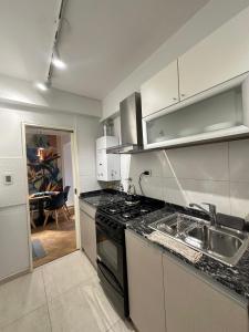 Køkken eller tekøkken på Corrientes Premium + 3 billeder