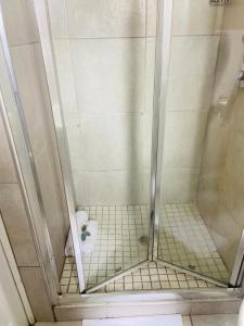 Et badeværelse på Sunshine Lodge + 1 billede