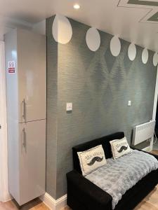 En eller flere senge i et værelse på Stanton - Impeccable and stylish 2 bedroom