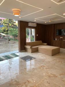 Et opholdsområde på The BoHomes - Peaceful Rooms with Mountain View located in Upper Tapovan + 49 billeder