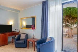 TV/trung tâm giải trí tại Hotel Terme Marine Leopoldo II TERME & SPA