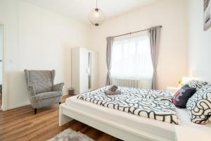 Postel nebo postele na pokoji v ubytování Twin Rooms with Private Bathroom