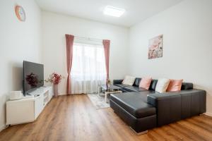 Posezení v ubytování Twin Rooms with Private Bathroom