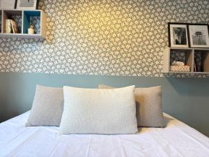 En eller flere senge i et værelse på Casa Vacanze