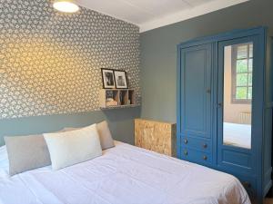 En eller flere senge i et værelse på Casa Vacanze