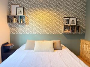 En eller flere senge i et værelse på Casa Vacanze