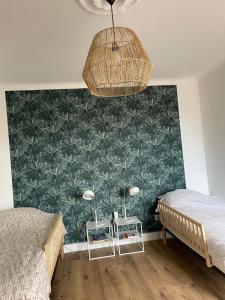 En eller flere senge i et værelse på L 'Évasion + 90 billeder