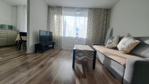 TV a/nebo společenská místnost v ubytování Sea Breeze Apartment