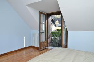 Ένα ή περισσότερα κρεβάτια σε δωμάτιο στο Gite à Cazaux - Bagnères de Luchon