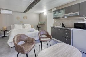 Кухня или мини-кухня в Short time suites Draguignan Altitude 3
