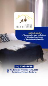 En eller flere senge i et værelse på Hotel João de Barro