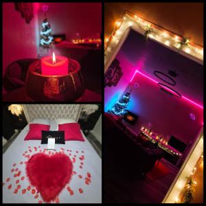 een kamer met een bed met een hart en een kaars bij L'échappée Sensuelle in Thiviers