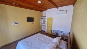 Ένα ή περισσότερα κρεβάτια σε δωμάτιο στο Eltoconar atacama