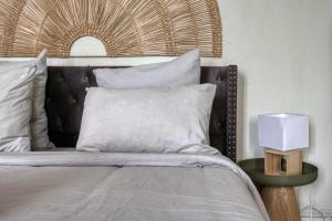 Кровать или кровати в номере Studio 2-ème étage Draguignan