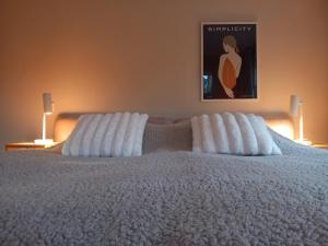 Posteľ alebo postele v izbe v ubytovaní studio Le Garage