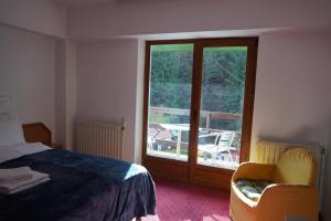 Postel nebo postele na pokoji v ubytování Pensiunea Kalinder