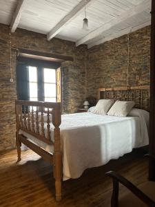 Кровать или кровати в номере Casa rural **** El Barreiro. Ideal para familias.