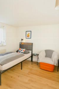 Ένα ή περισσότερα κρεβάτια σε δωμάτιο στο Renovated apartment near Büdingen with single beds +8 φωτογραφίες