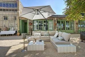 Гостиная зона в Chambres d'hôte Le Mas Laurent