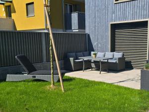 Κήπος έξω από το Ferienhausträume Bergstrasse Bodensee - inkl Tiefgarage, Garten und Dachterrasse