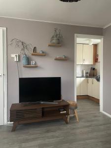 TV a/nebo společenská místnost v ubytování Me Oissie
