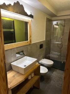 O baie la Appartamento PELMO