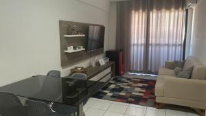 Et tv og/eller underholdning på Ap mobiliado Praia de Iracema