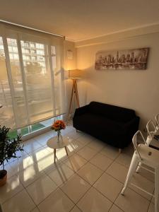 Et opholdsområde på Depto Excelente Ubicacion con Estacionamiento