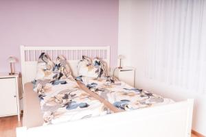 Ένα ή περισσότερα κρεβάτια σε δωμάτιο στο Erholung am Ginkgobaum