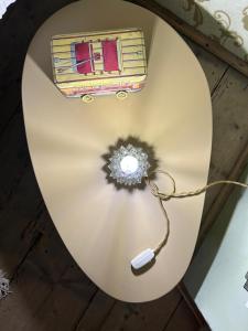 a table with a phone on top of it at La Maisonette in Feltre