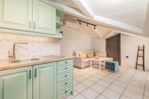 Η κουζίνα ή μικρή κουζίνα στο Mavra Elegant Apartments