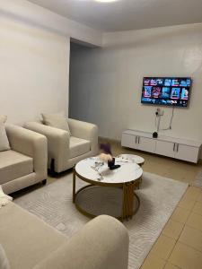 TV a/nebo společenská místnost v ubytování The nomads nest