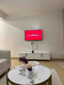 TV a/nebo společenská místnost v ubytování The nomads nest