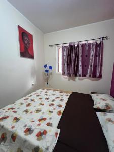 Postel nebo postele na pokoji v ubytování Tropical Breeze Holidays