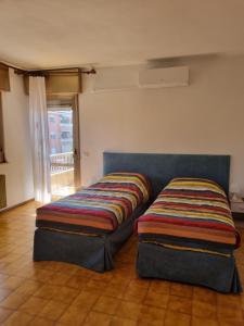 Cama o camas de una habitación en Affittacamere Ely