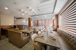 Χώρος καθιστικού στο Tripli Hotels Shivaay