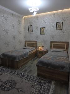 Postel nebo postele na pokoji v ubytování Guesthouse