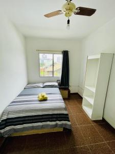 Ένα ή περισσότερα κρεβάτια σε δωμάτιο στο Da Praia Hotel