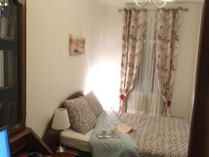 En eller flere senge i et værelse på maison avec terrasse