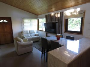 Una televisión o centro de entretenimiento en Cabaña O'Higgins