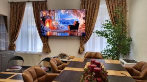 TV a/nebo společenská místnost v ubytování Apartments Ulrich vonLiechtenstein