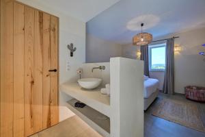 Кровать или кровати в номере Chambres d'hôte Le Mas Laurent