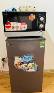 Kuchyň nebo kuchyňský kout v ubytování Ha Noi Old Quarter Apartment L'Thao + 8 fotografií