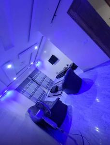 an overhead view of a room with blue lights at Superetoile in Rufisque